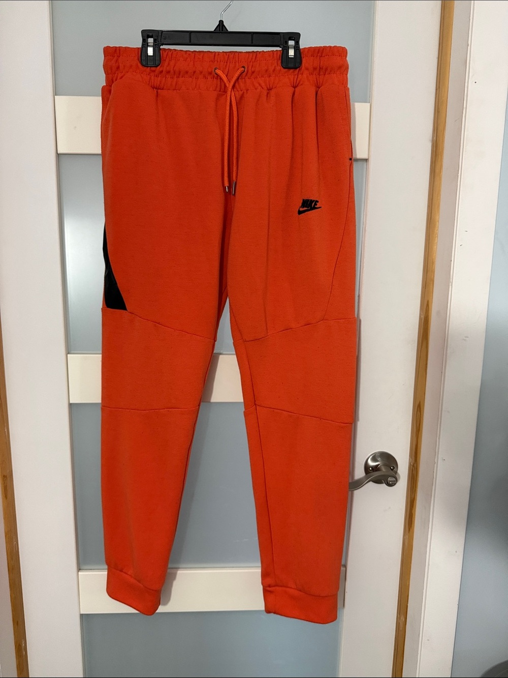 Nike Orange Jogger Sweatpants with Black Accent Logo